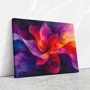 a painting of a colorful flower on a white wall