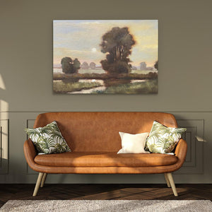 a living room with a couch and a painting on the wall