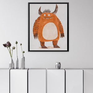 a picture of a monster on a wall above a cabinet