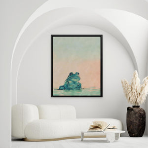 a living room with a white couch and a painting on the wall