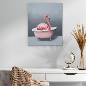 a pink bath tub with a pink flamingo in it