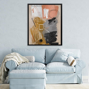 a living room with a blue couch and a painting on the wall