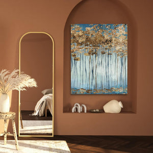 a painting hanging on a wall next to a mirror