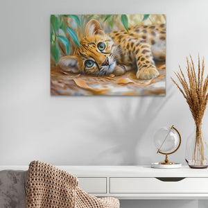 a painting of a baby tiger laying on the ground