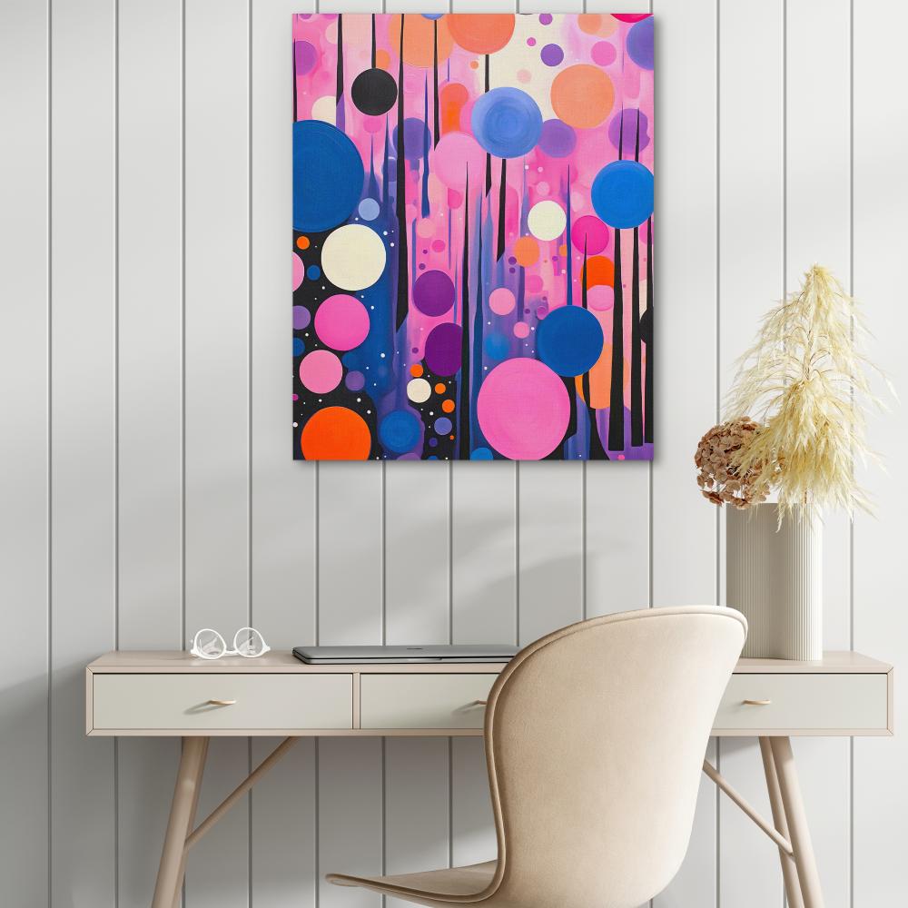 a desk with a chair and a painting on the wall