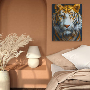 a painting of a tiger on a wall above a bed