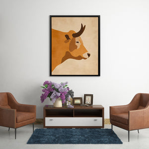 a living room with a cow painting on the wall