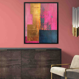 a living room with pink walls and a painting on the wall