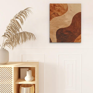 a white vase sitting on top of a wooden shelf