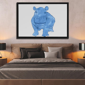 a picture of a rhinoceros on a wall above a bed