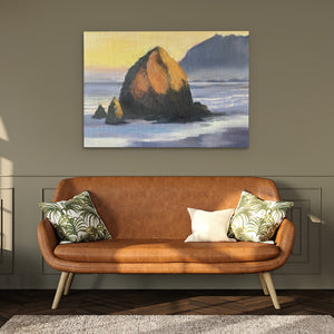 a painting of a rock on a wall above a couch