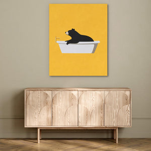 a picture of a bear sitting in a bathtub