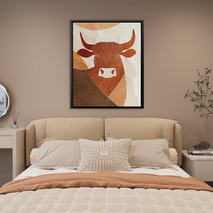 a picture of a cow on a wall above a bed