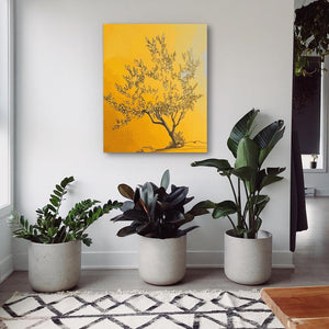 three potted plants in front of a yellow painting