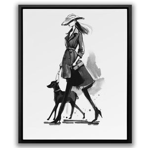 a black and white photo of a woman walking two dogs