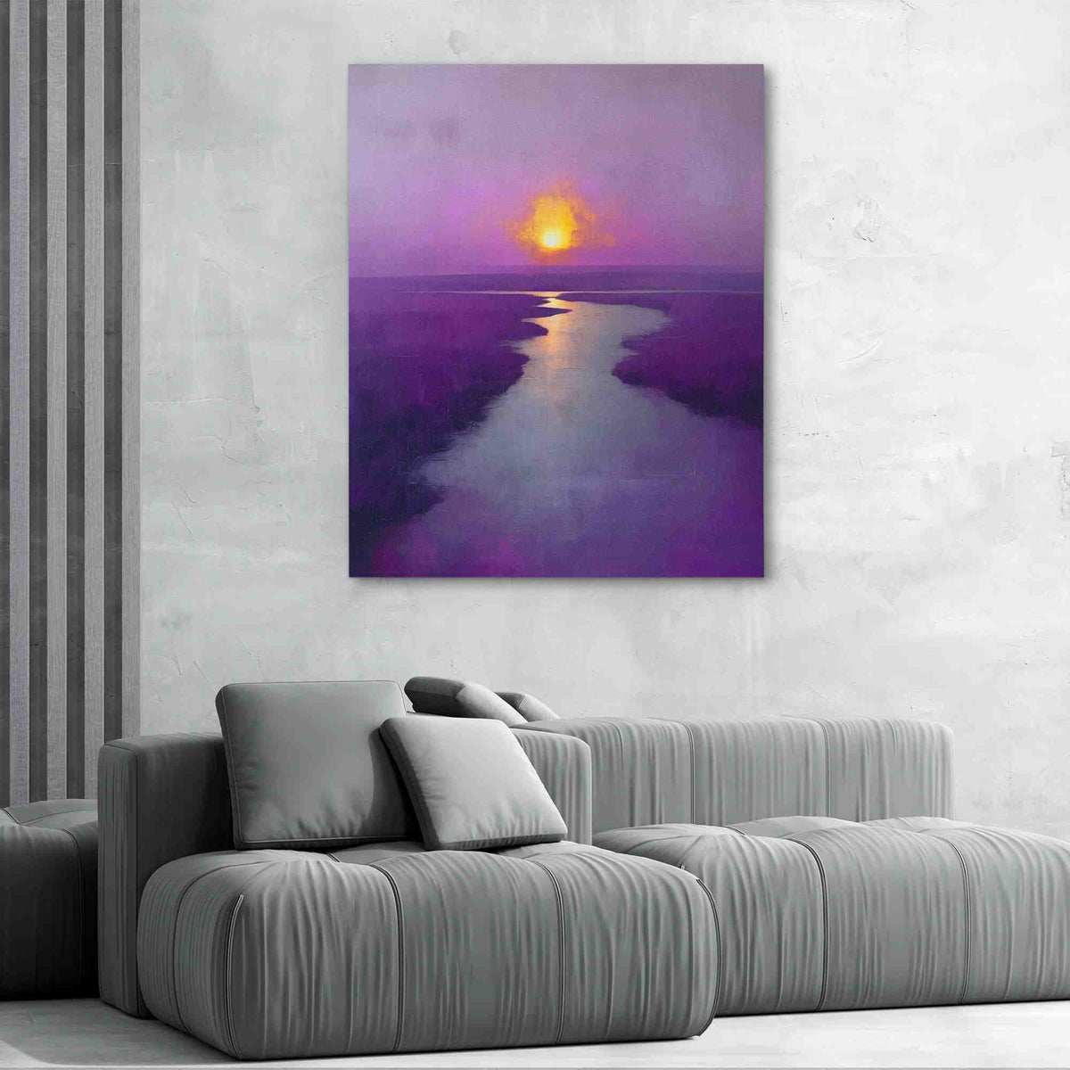 a living room with a couch and a painting on the wall