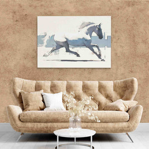 a living room with a couch and a horse painting on the wall