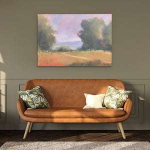 a couch in a room with a painting on the wall