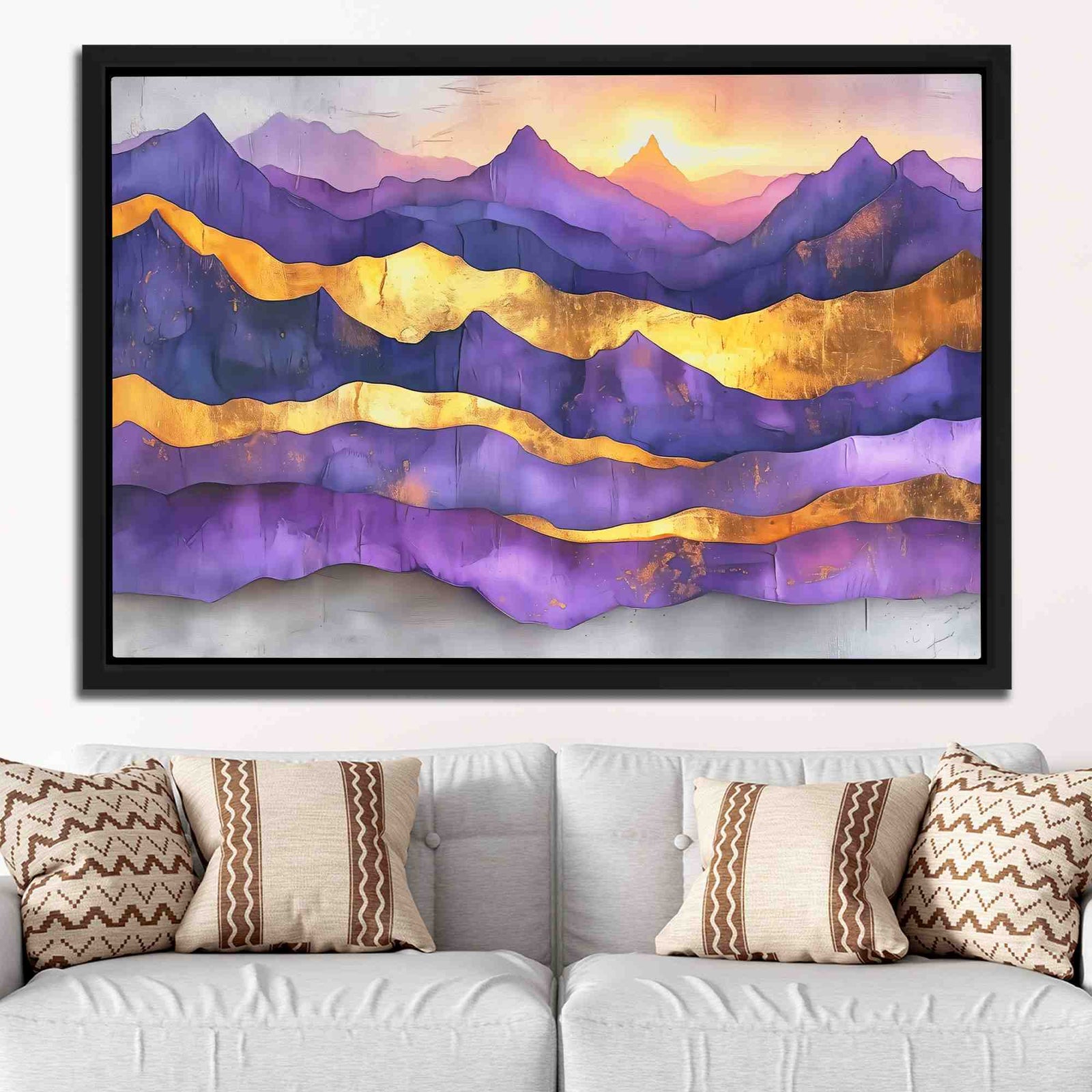 a living room with a couch and a painting on the wall