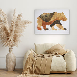 a picture of a bear on a wall above a couch