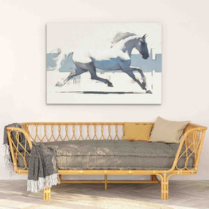 a couch with a horse painting on the wall above it