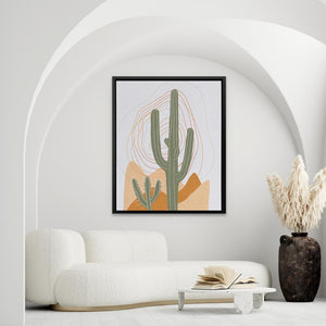 a living room with a white couch and a cactus