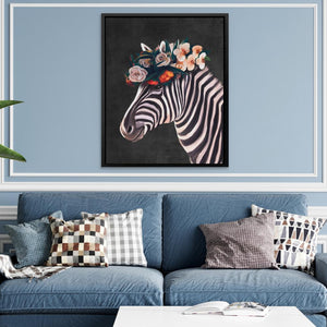 a living room with a blue couch and a painting of a zebra