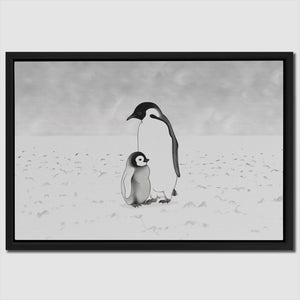 a black and white photo of a penguin and a penguinling