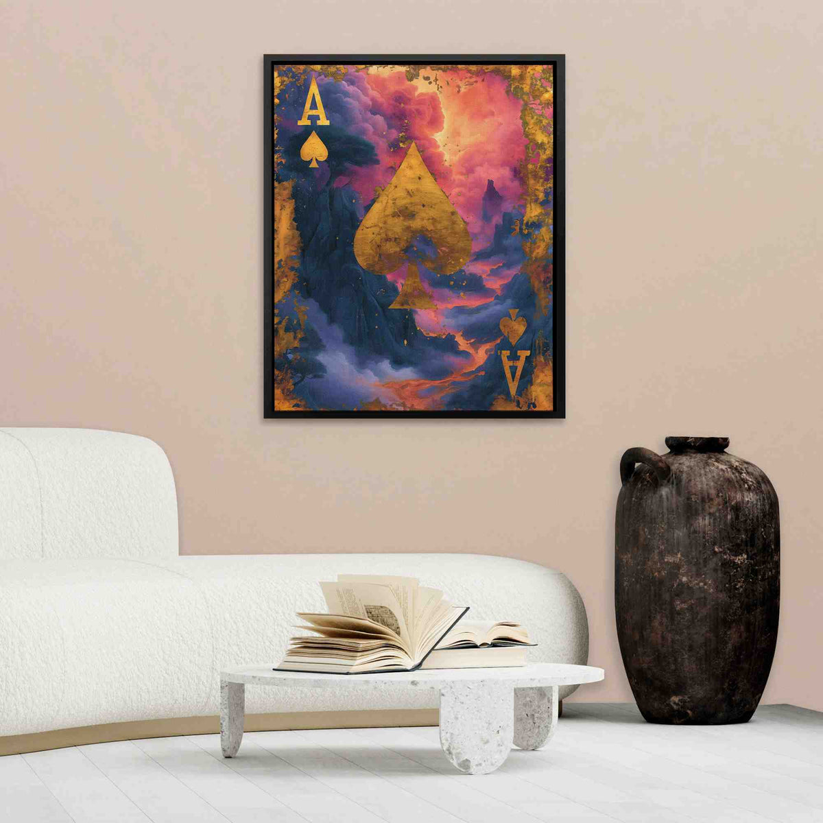 a room with a white couch and a painting on the wall