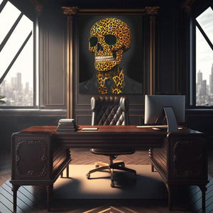 a desk with a laptop and a skull on it