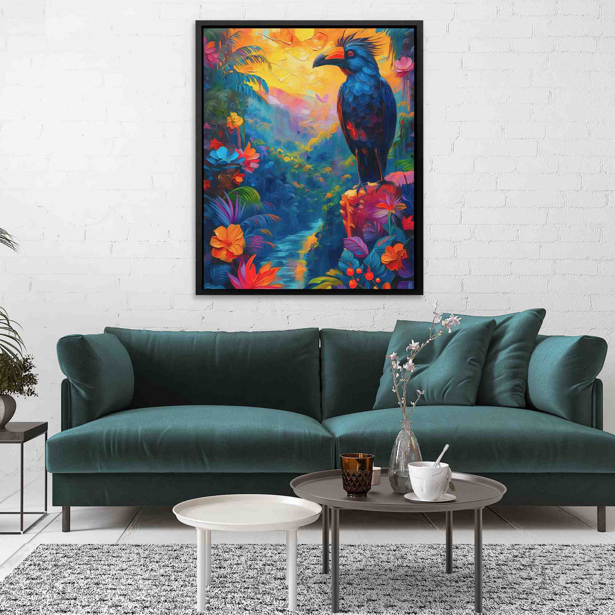a living room with a blue couch and a painting on the wall