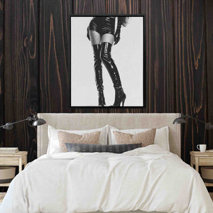 a picture of a woman in high heels on a bed