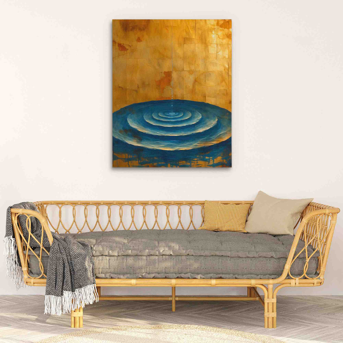 a living room with a couch and a painting on the wall