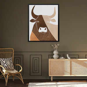 a picture of a cow on a wall in a living room