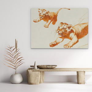 a painting of two tigers on a white wall