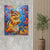 a painting of a squirrel on a wall next to a potted plant