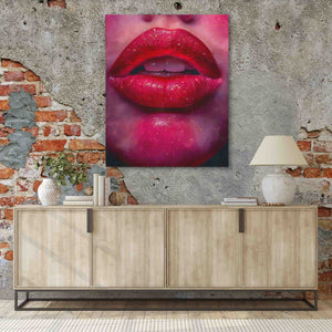 a painting of a woman's lips on a brick wall