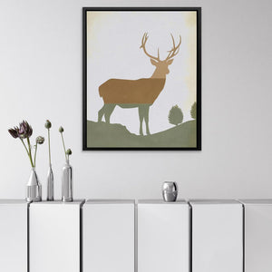 a picture of a deer is hanging on a wall