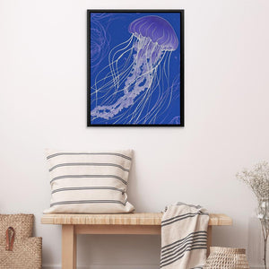 a picture of a jellyfish floating in the water