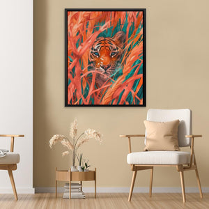 a living room with a chair and a painting on the wall