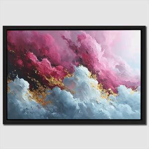 a painting of pink and gold clouds in a black frame