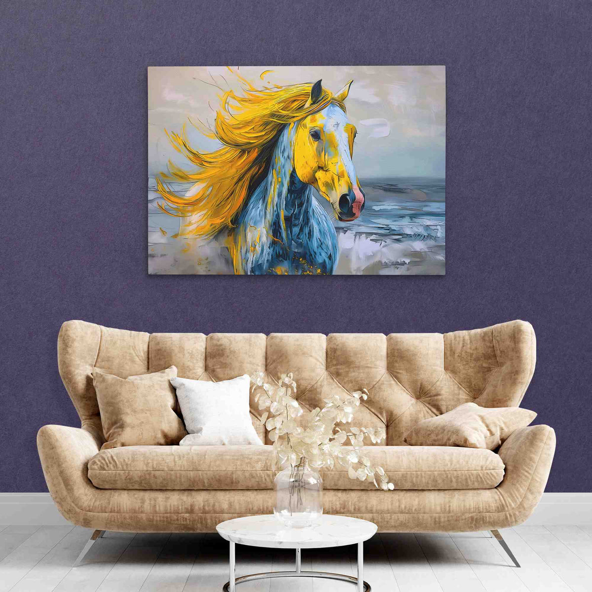 a living room with a couch and a painting on the wall