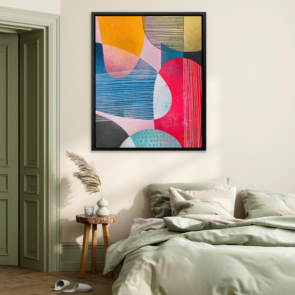 a colorful abstract painting on a white wall