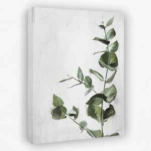 a painting of a green plant on a white wall