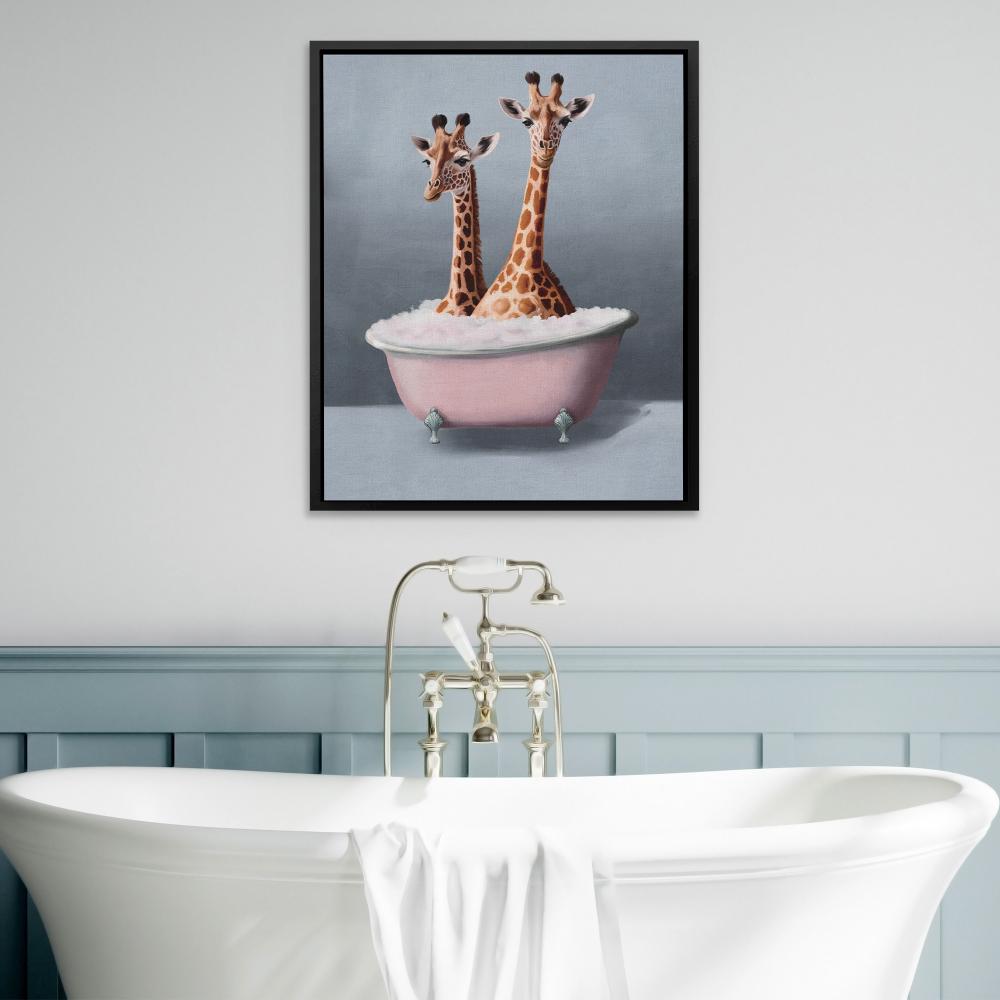 two giraffes are sitting in a bathtub together