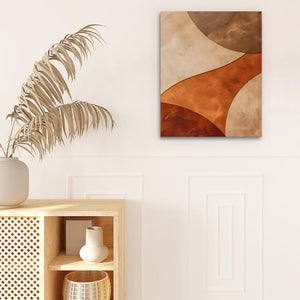 a white vase sitting on top of a wooden shelf