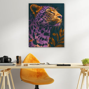 a painting of a leopard on a wall above a desk