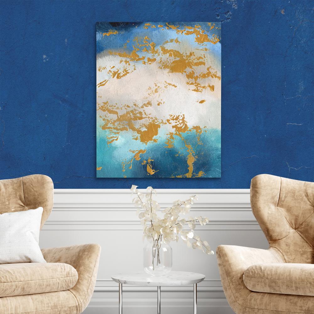 a blue and gold painting on a white wall