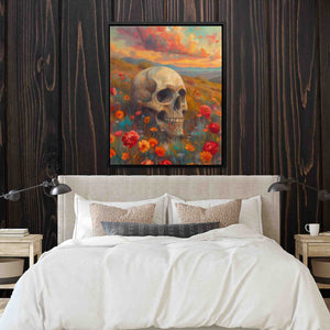 a painting of a skull on a wall above a bed